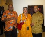 Kishore & Rekha Shivdasani with Ajay De at satish gupta art event in Mumbai on 12th Feb 2013.jpg